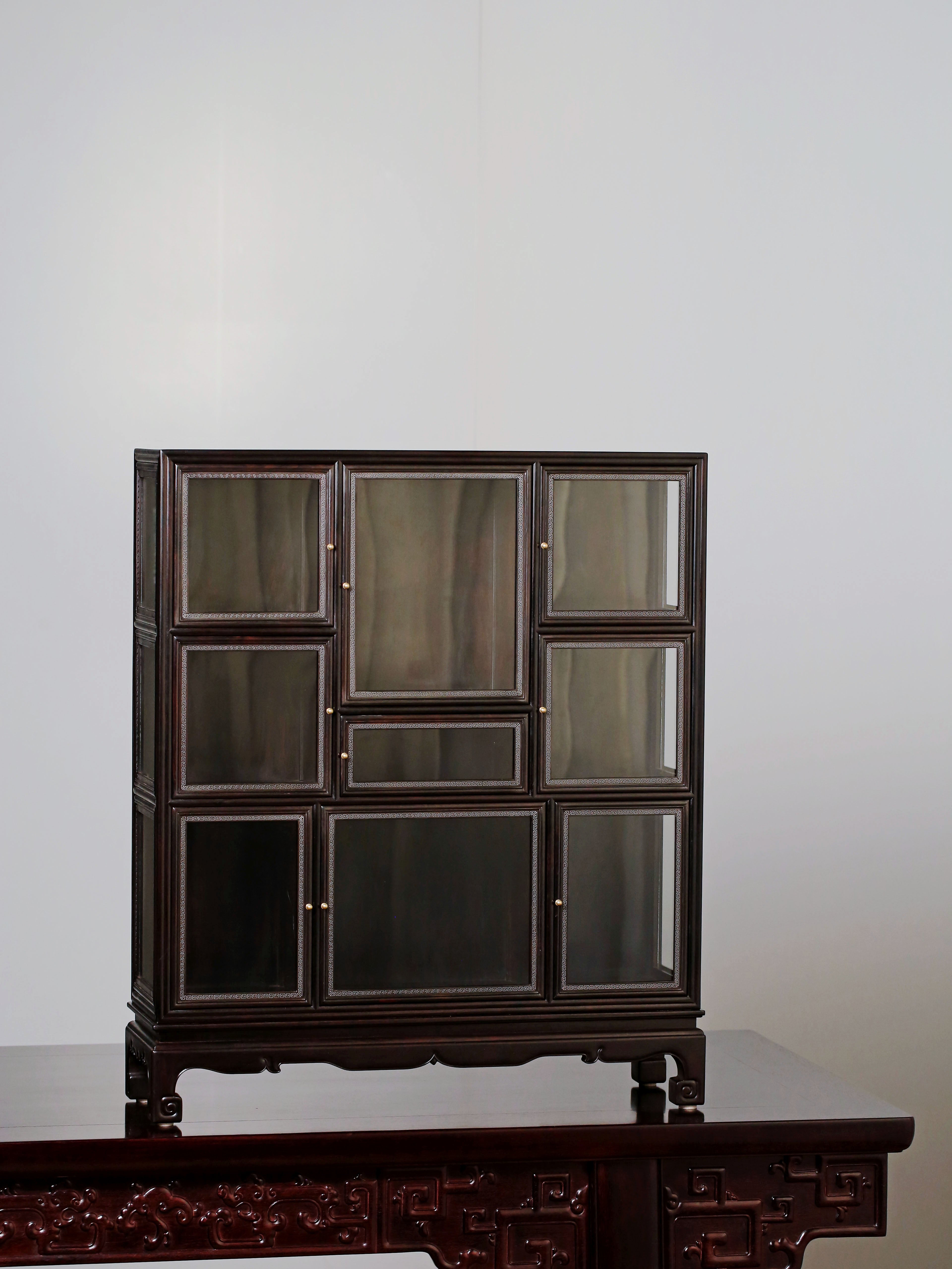 Purple sandalwood inlaid with silver wire fretwork multi-treasure cabinet