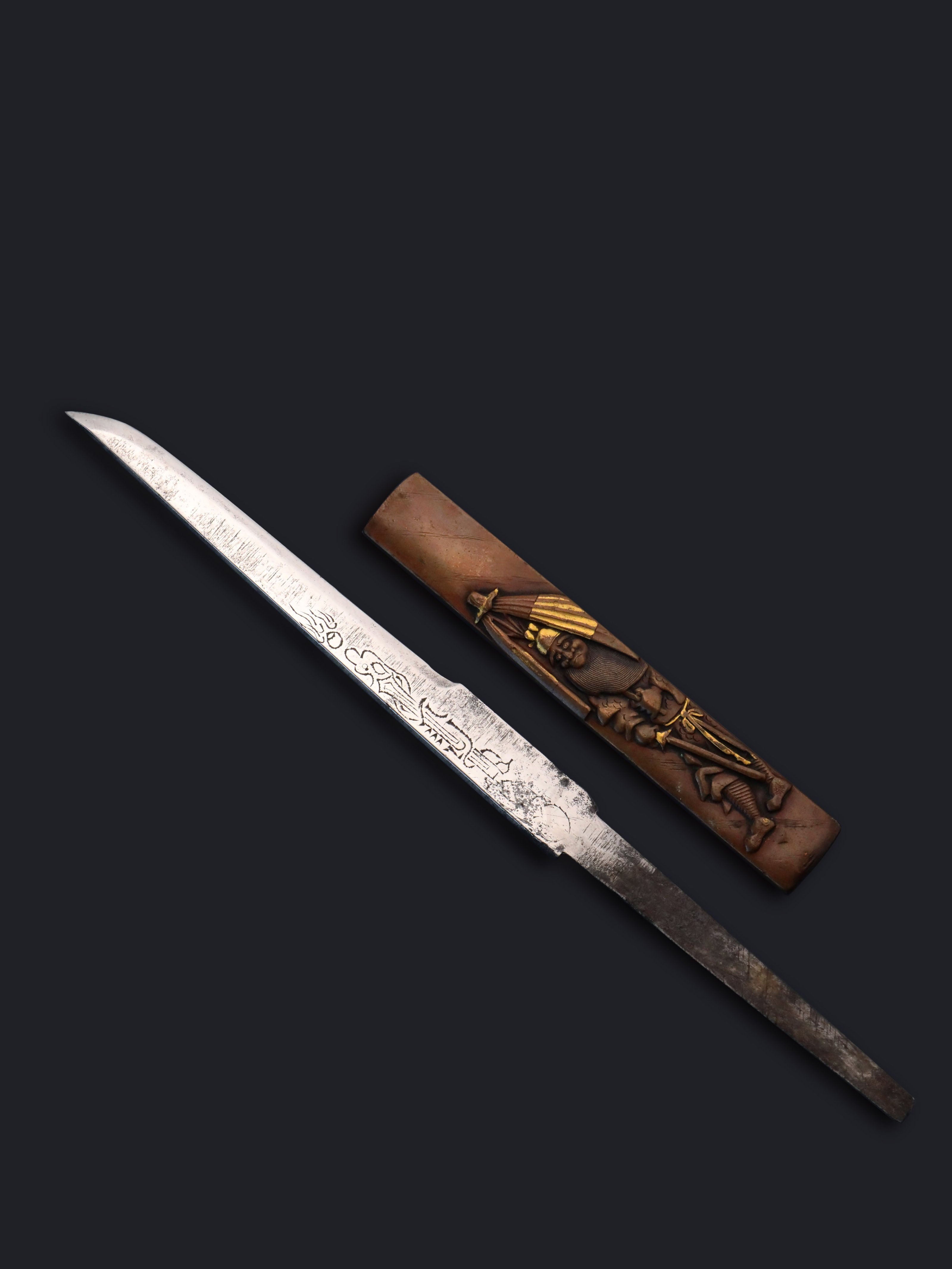 A small knife depicting Zhong Kui from the Edo period in Japan.