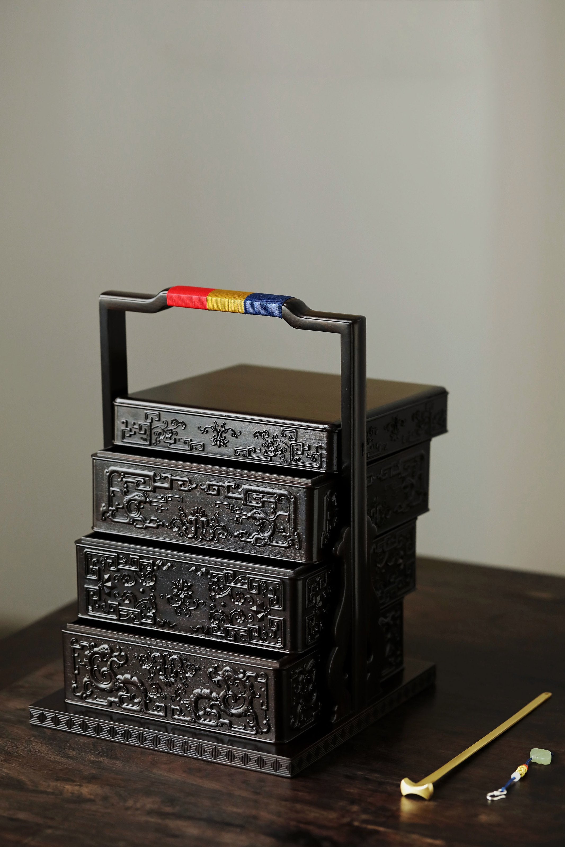 Purple sandalwood carved square box with kui dragon and phoenix patterns