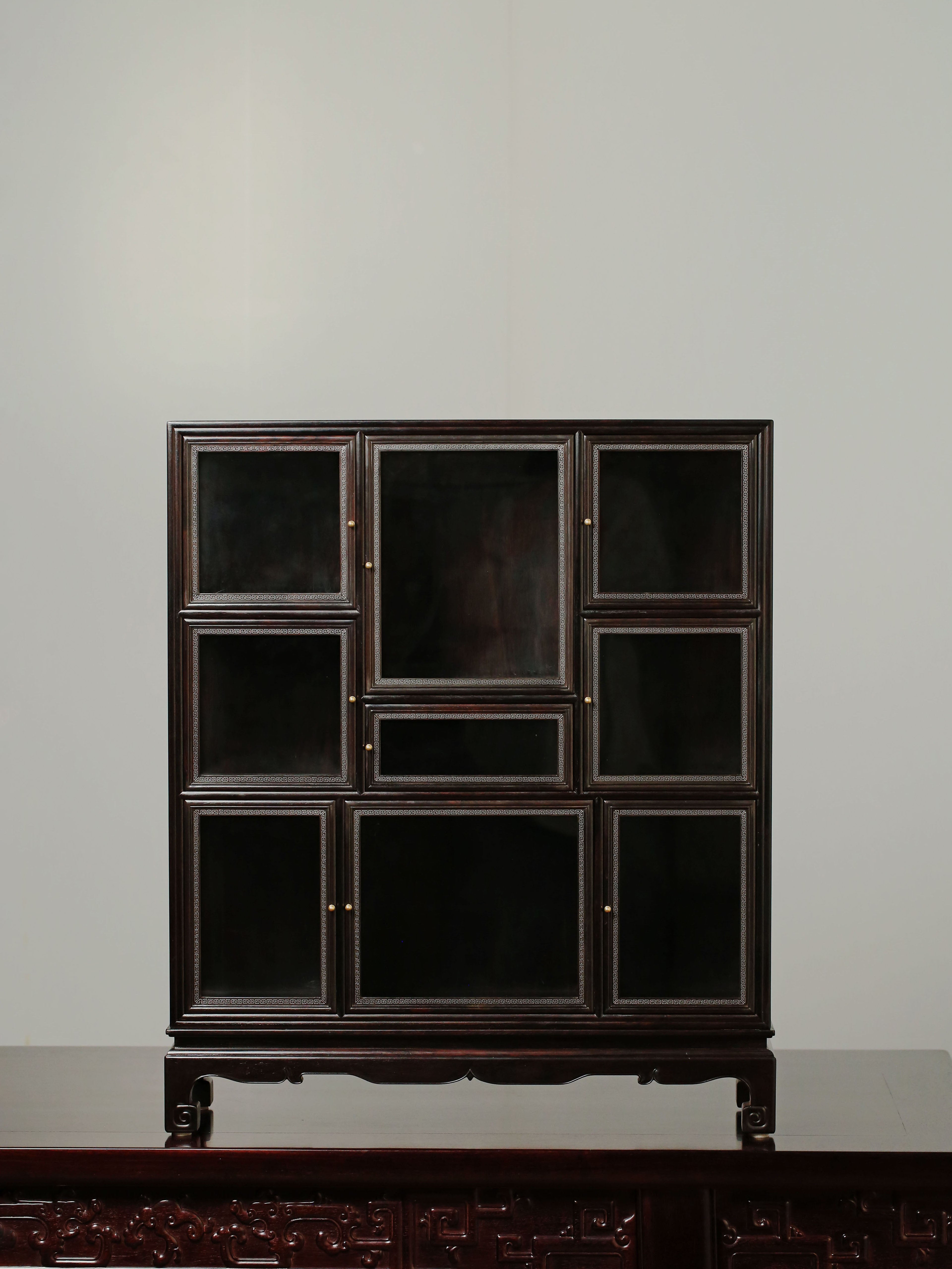 Purple sandalwood inlaid with silver wire fretwork multi-treasure cabinet