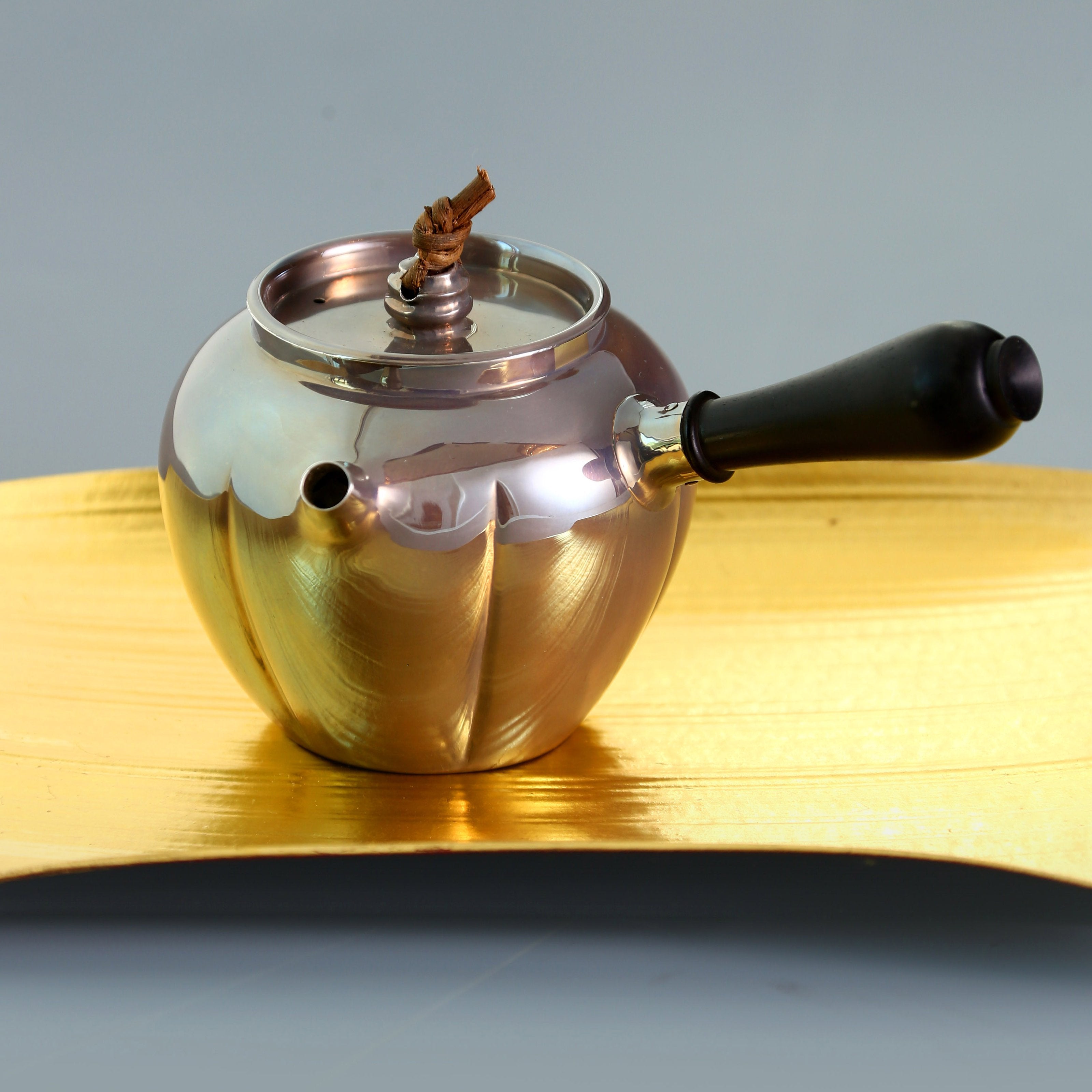 Purple-skinned melon-shaped teapot with side handle, pure silver teapot