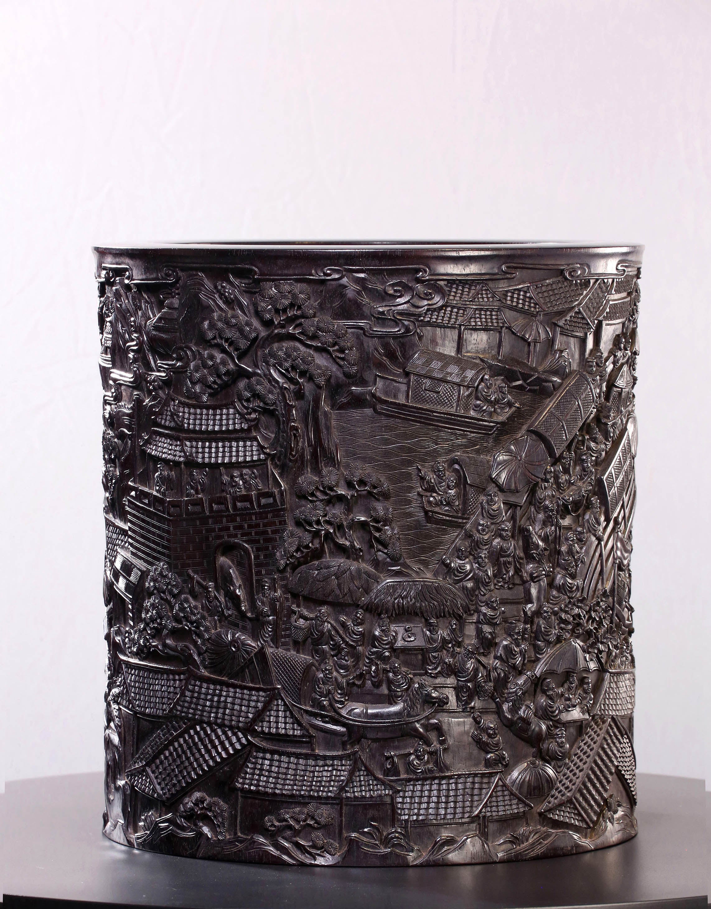 Indian rosewood brush holder depicting the Qingming Scroll