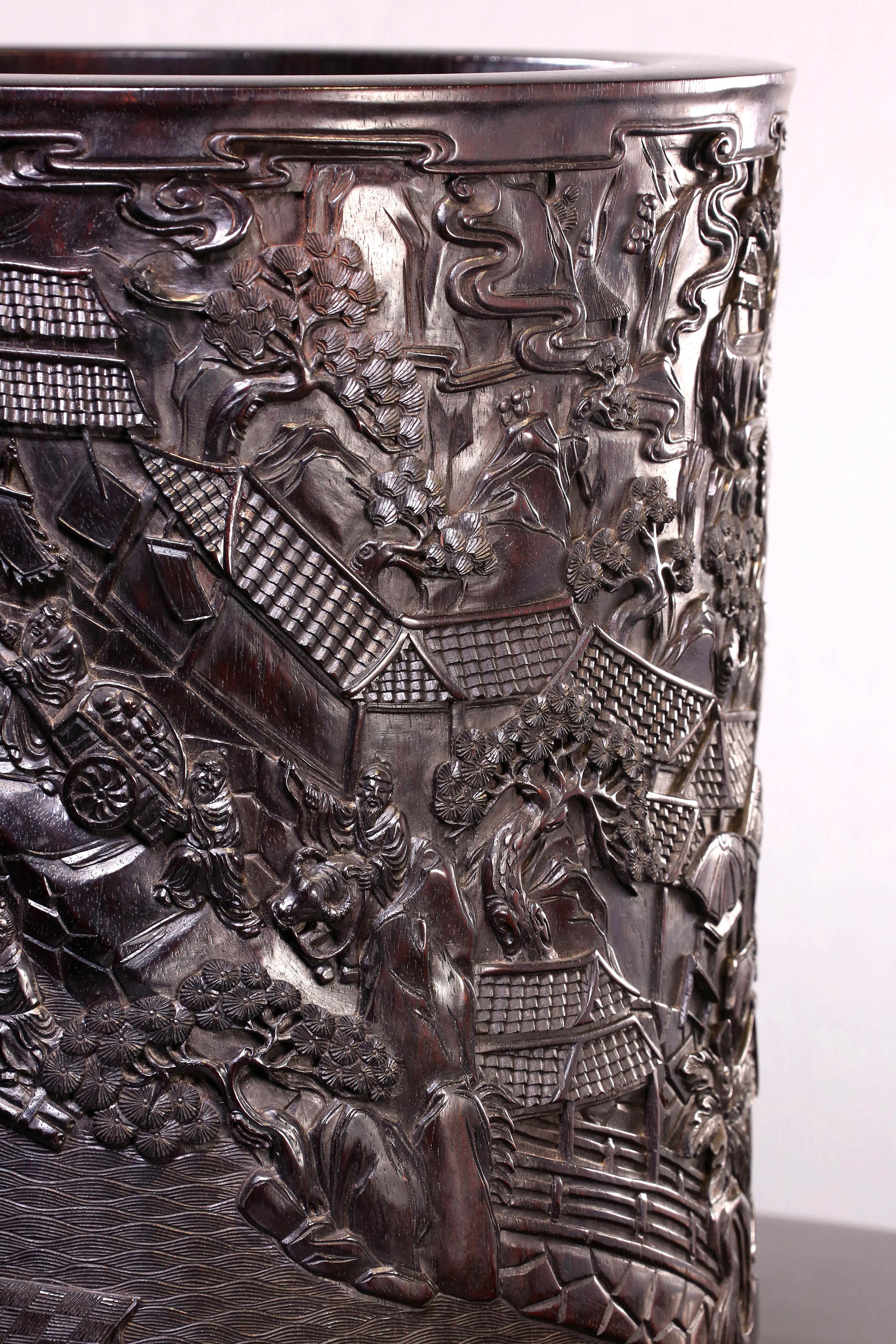 Indian rosewood brush holder depicting the Qingming Scroll