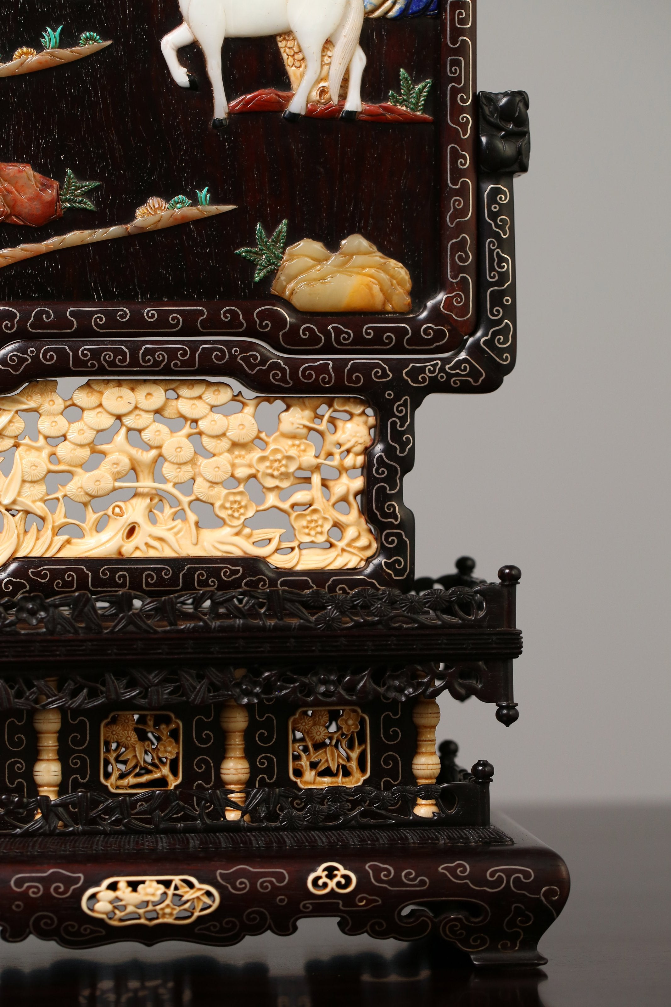 Rosewood screen inlaid with precious stones and mammoth ivory